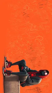 Spider-Man Lounging Against an Orange Wall